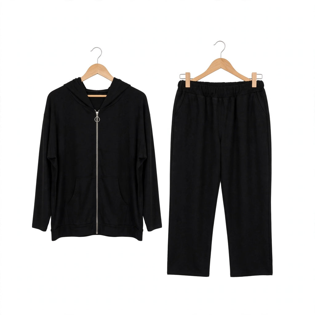 Conjunto deportivo negro las cucadas de erisa con sudadera de cremallera y pantalón de corte relajado