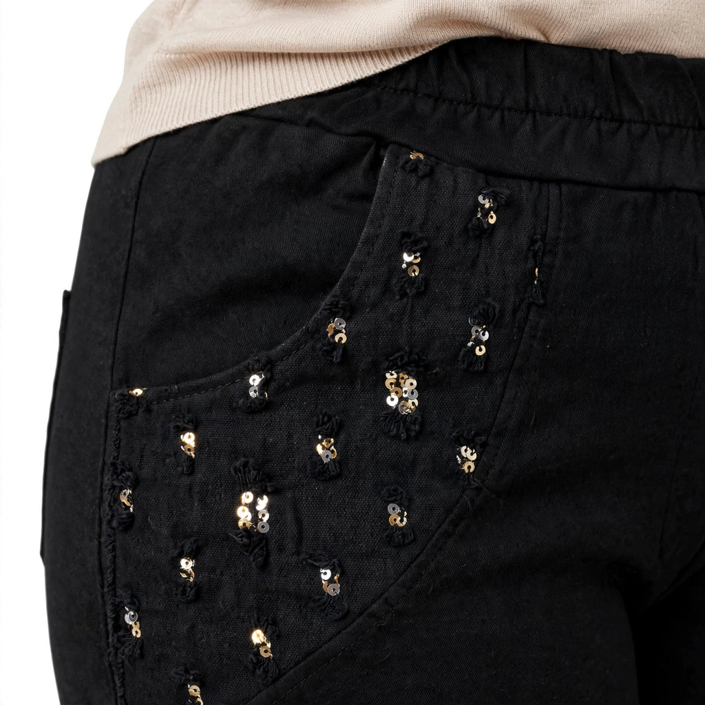 Pantalón negro casual de las cucadas de erisa con cintura elástica y bolsillos decorados con lentejuelas brillantes