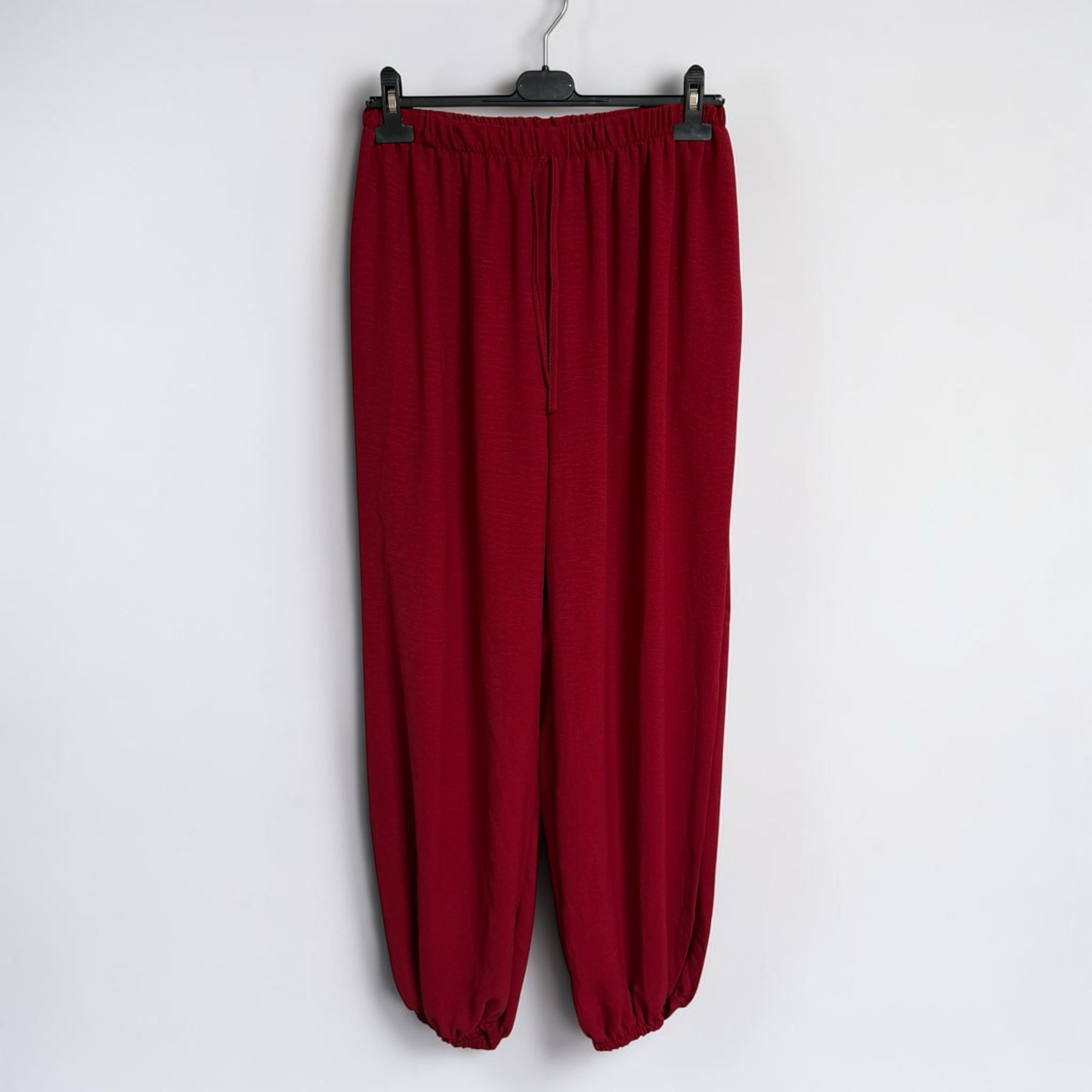 Pantalones jogger rojos holgados de las cucadas de erisa con cintura elástica y bajos ajustados en tejido ligero