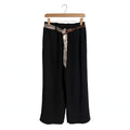 Pantalones negros de corte recto las cucadas de erisa con cintura elástica y cinturón decorativo trenzado y estampado